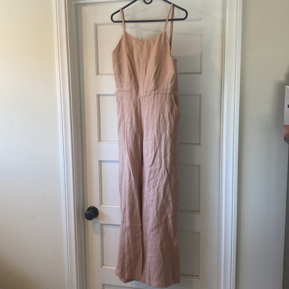 Never worn jumper- peachy-tan color.